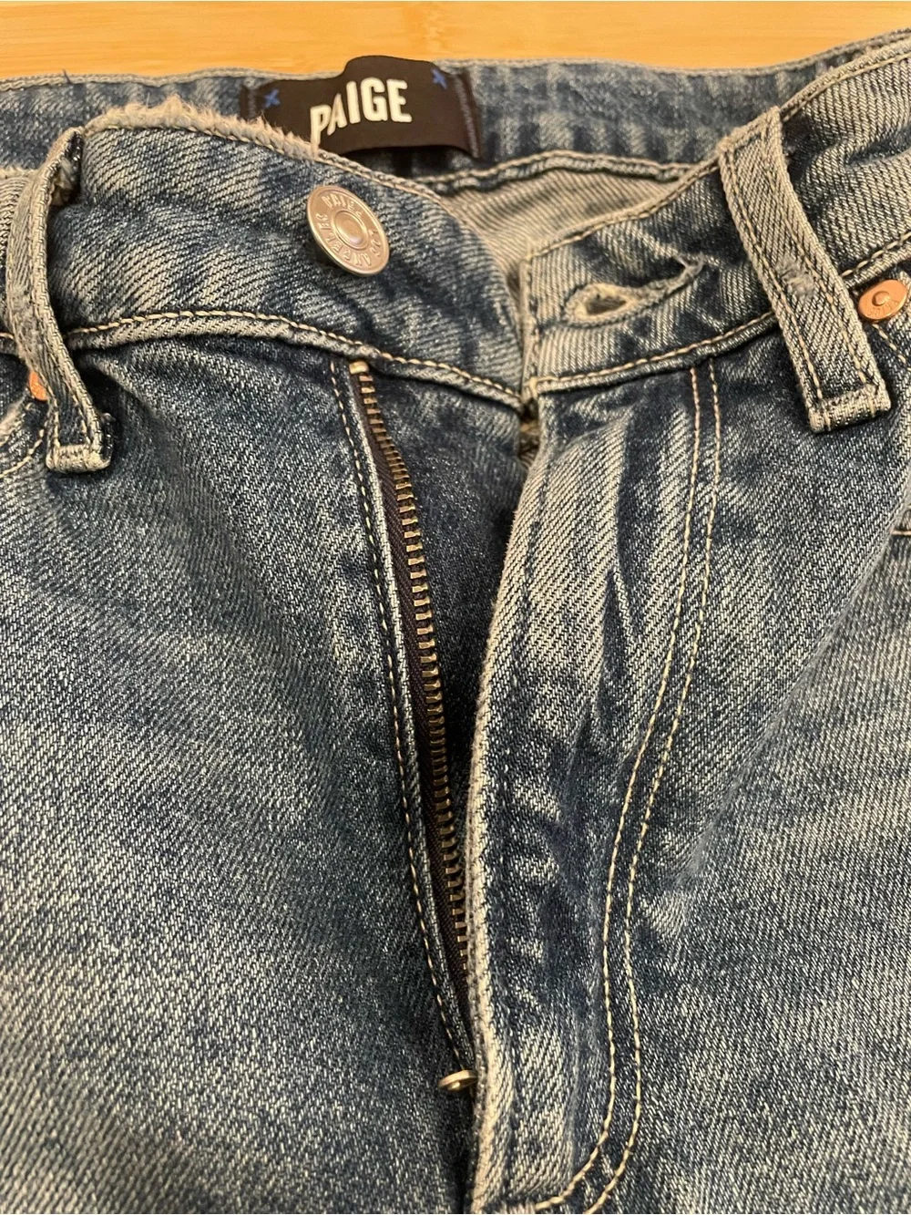 PAIGE High-Rise Flare Jeans in Medium Blue with Distressed Knees - Picture 7 of 9